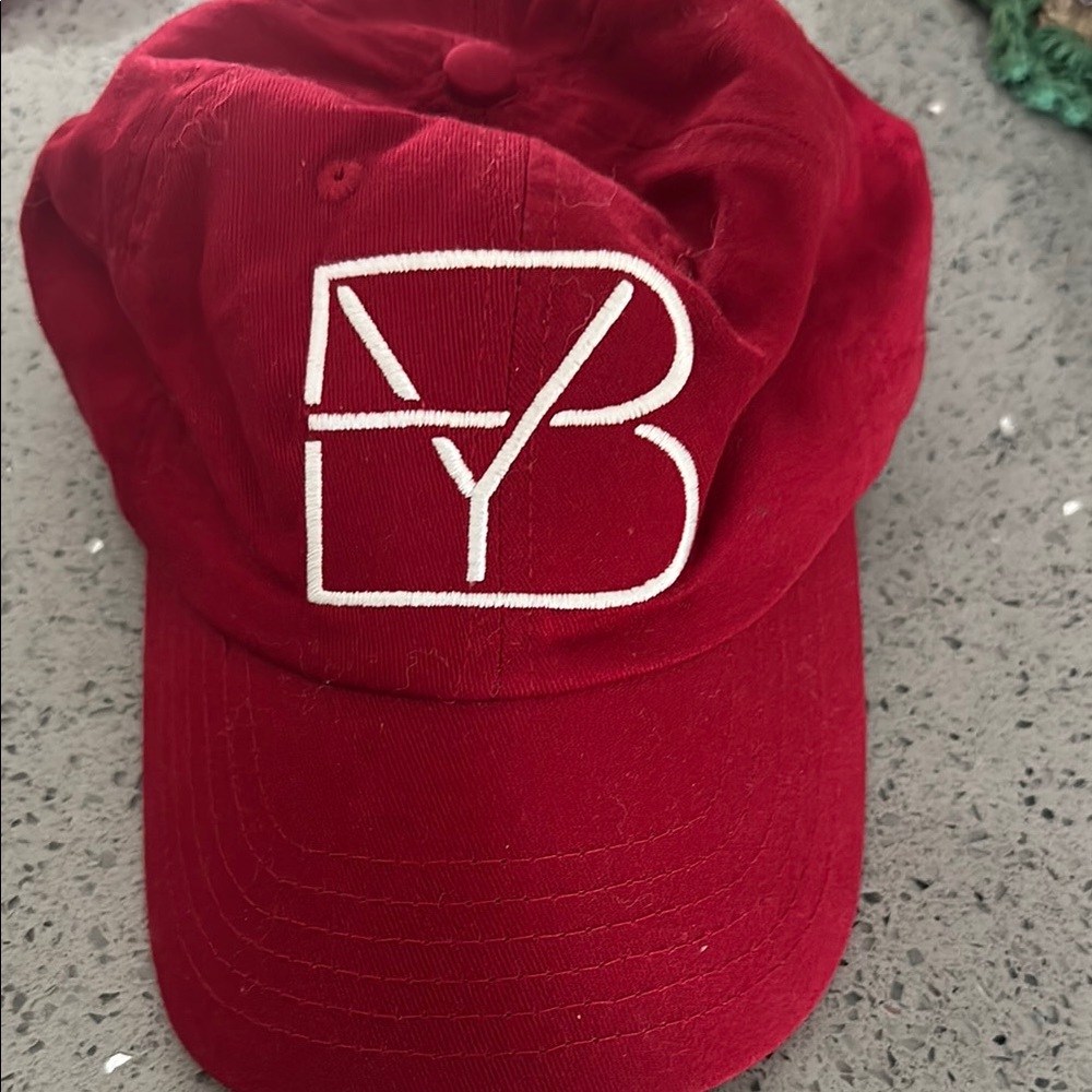 Brett Young Red Baseball Cap with White Logo. With BY synch bag & signed image